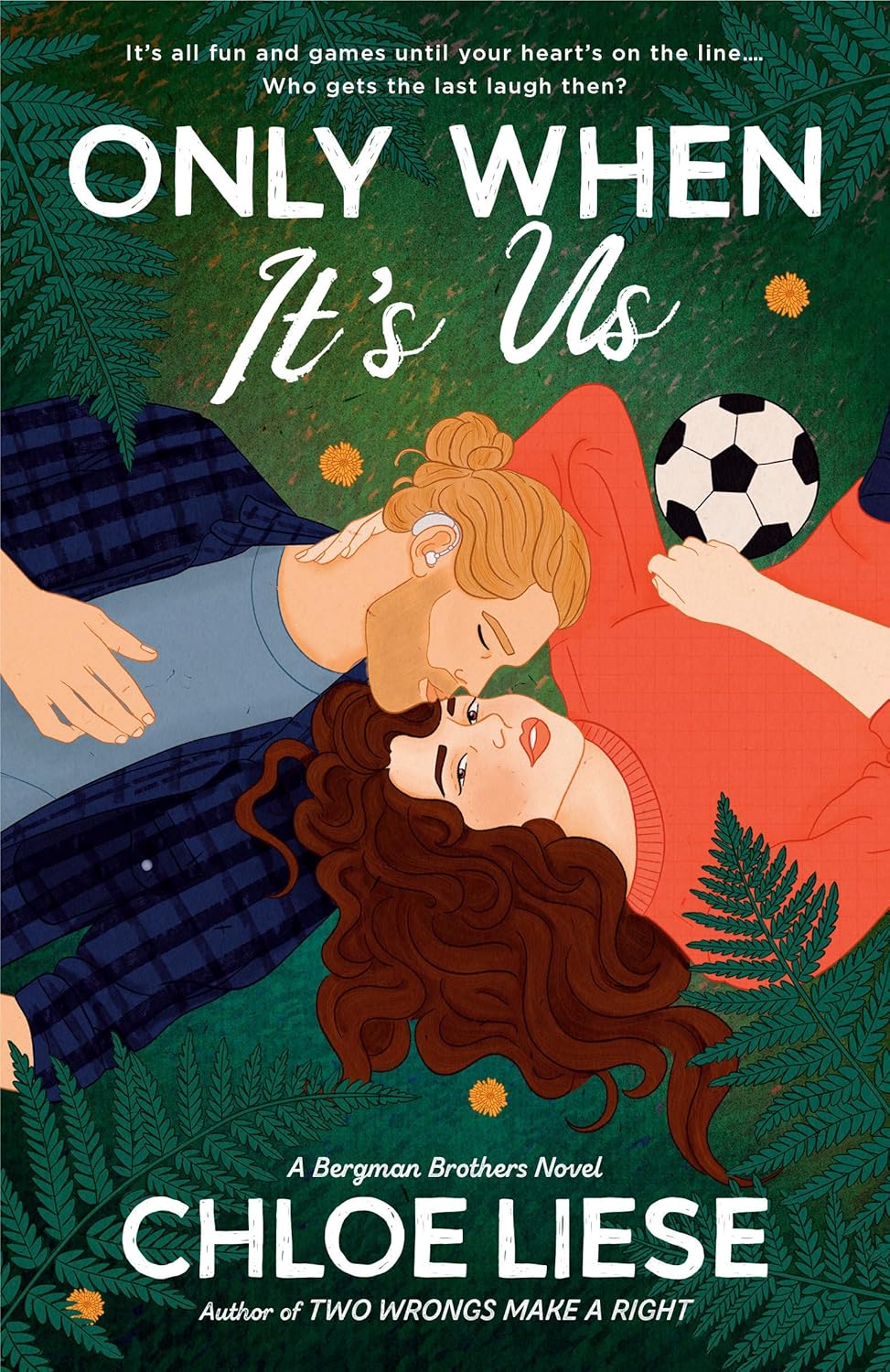 Cover of Only When It's Us. The couple is lying on a field with ferns around them. There's a soccer ball lying beside them, too.
