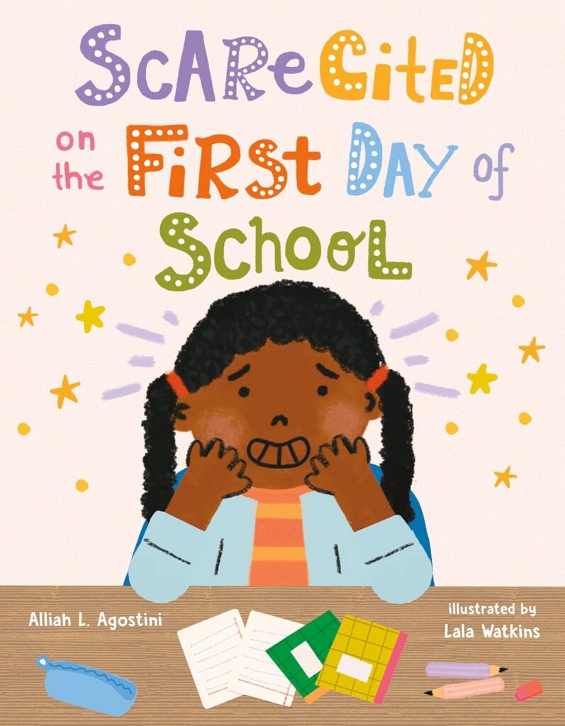 Cover of Scarecited on the First Day 0f School. Young girl is smiling a scared smile in the center of the cover. She has stars around her, and some school supplies on the table in front of her.