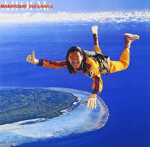 Cover of CD, All of Me by Masayoshi Takanaka. Man skydiving over a dark blue ocean and an island.